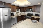 Kitchen With Granite Counter Tops & Stainless Steel Appliances